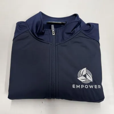 <p>Embriodered Gilet Folded on display showing company Logo.</p>
